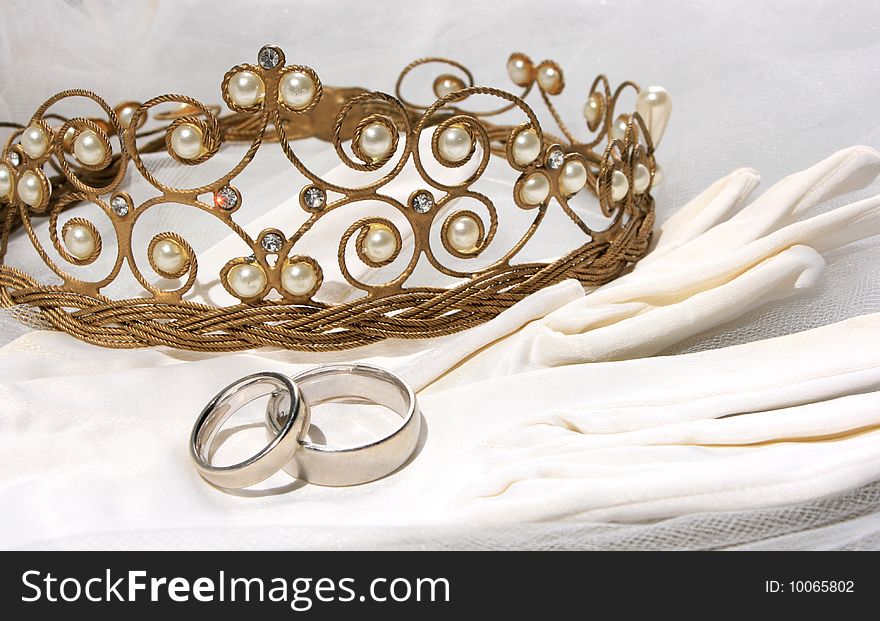 Wedding still life with rings, white gloves and tiara. Wedding still life with rings, white gloves and tiara