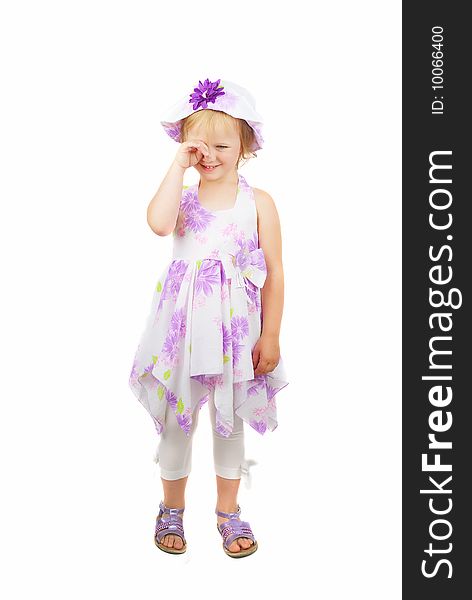 Caucasian cute little girl wearing a purple summer dress and heat starting Cray, isolated on white background. Caucasian cute little girl wearing a purple summer dress and heat starting Cray, isolated on white background.