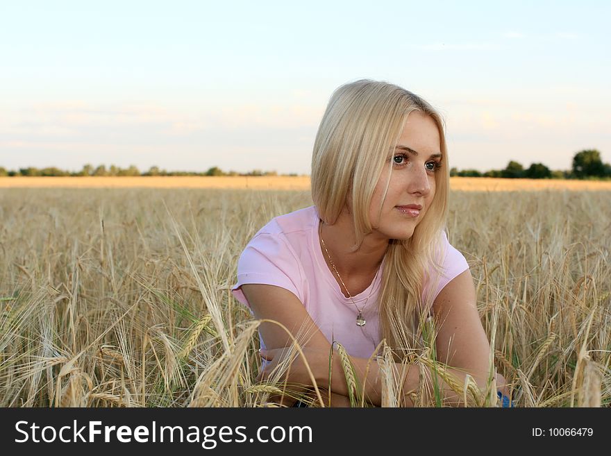 The blond girl in the wheat, Ukraine. The blond girl in the wheat, Ukraine