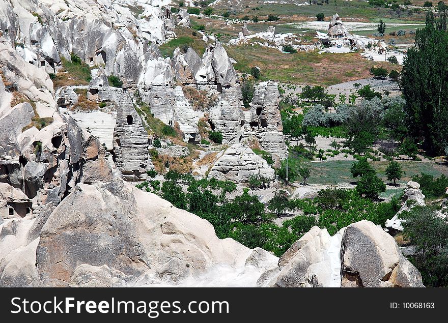 Goreme is a town in the Cappadocia region of Turkey. The town is centered in the middle of a internationally popular region that is best known for its natural rock formations, often called fairy chimneys. Goreme is a town in the Cappadocia region of Turkey. The town is centered in the middle of a internationally popular region that is best known for its natural rock formations, often called fairy chimneys.