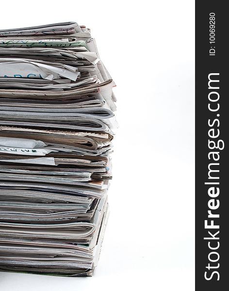 Stack of magazines on white background