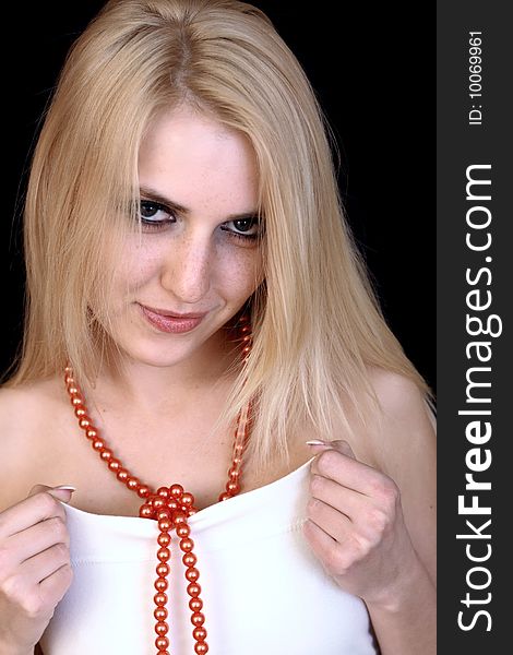 Portrait of the blond girl with beads. Portrait of the blond girl with beads