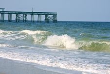 Beach With Pier Royalty Free Stock Images