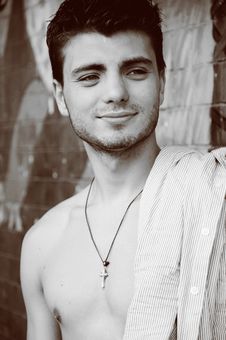 Young Sexy Man Near The Brick Wa Stock Photography Young Sexy Man Near The Brick Wa Stock Photography
