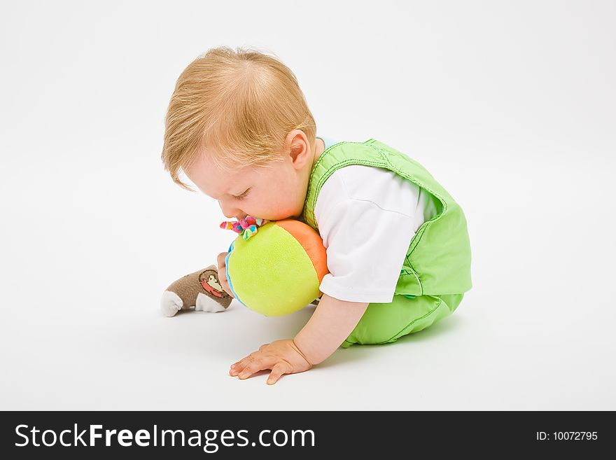 Little baby boy in green a pair of trousers