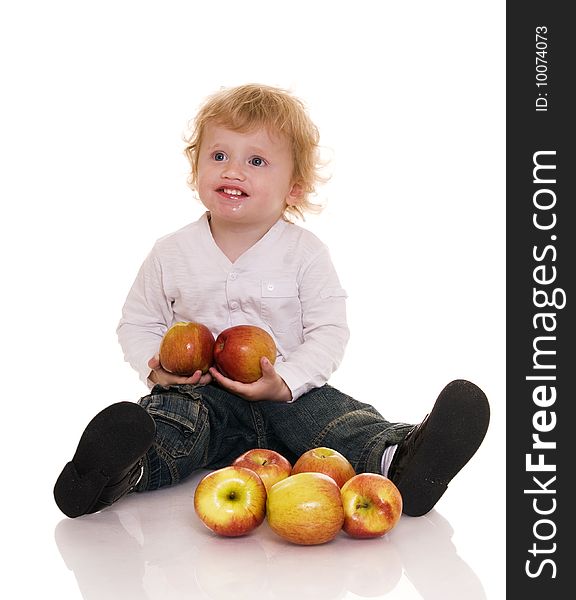 Baby with apple isolated on white. Baby with apple isolated on white.