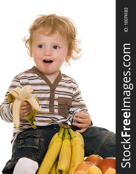 Baby with fruit isolated on white. Baby with fruit isolated on white.