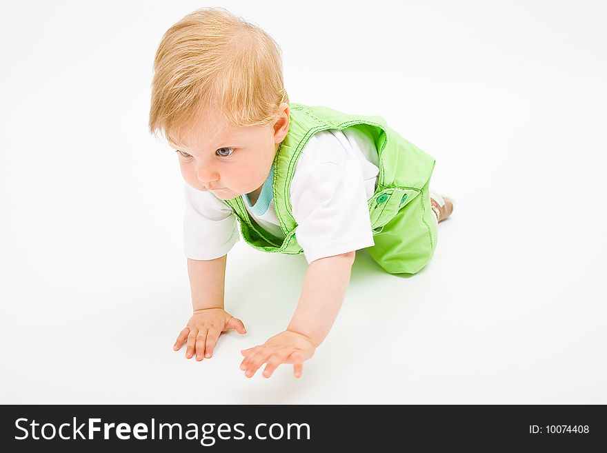 Little baby boy in green a pair of trousers