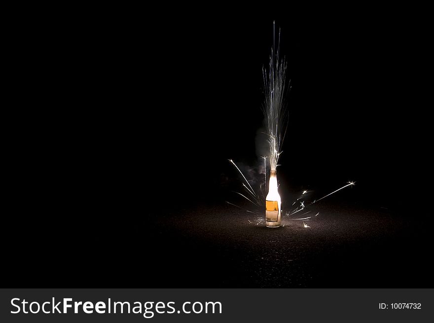 A Firework Exploding in a Glass Bottle. A Firework Exploding in a Glass Bottle