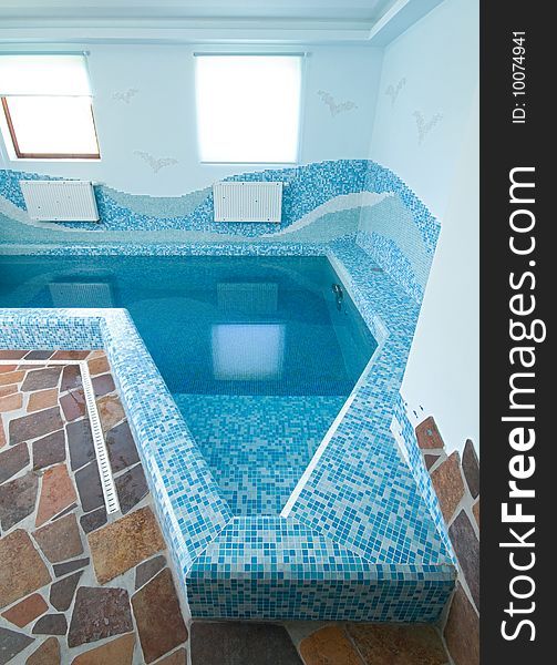Interior of a swimming pool in blue colors