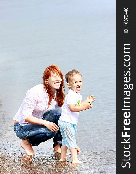 Mother and son on beach