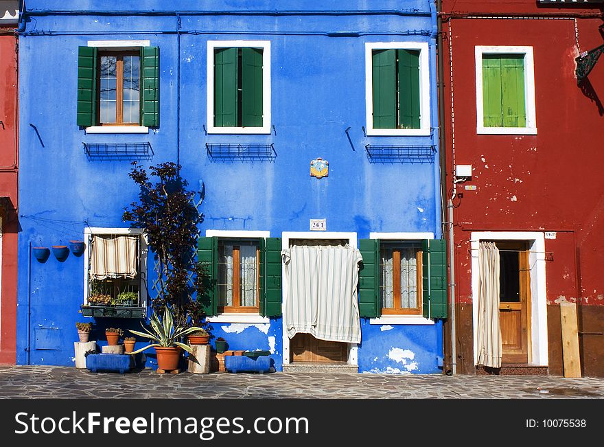 Street with houses painted in bright colors. Street with houses painted in bright colors