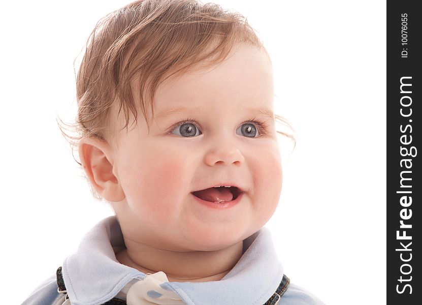 Portrait of adorable happy blue-eyes baby boy