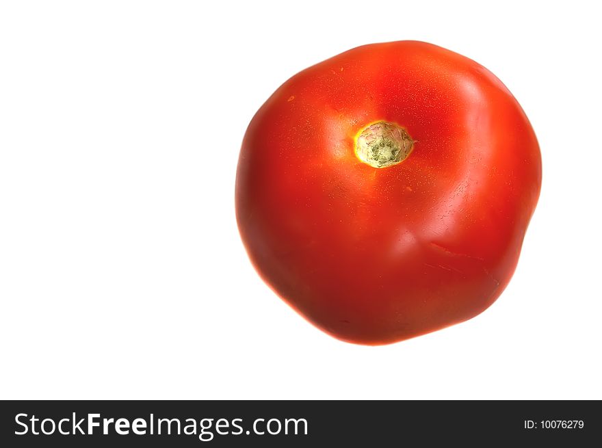 Single fresh red tomato, isolated on white