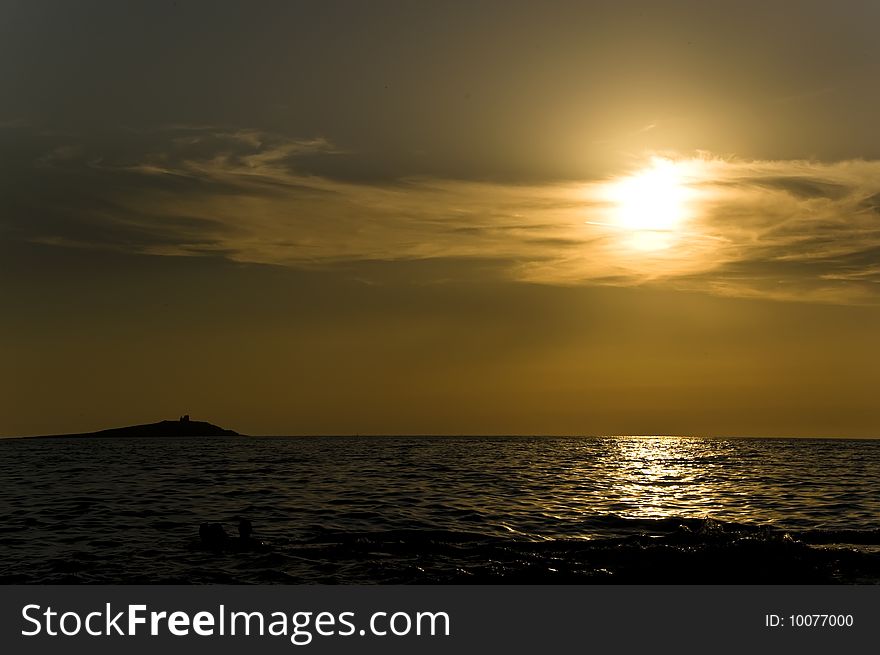 Island At Sunset