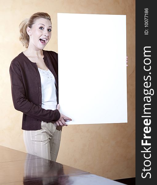 Young Caucasian Professional Lady Holding White Board. Young Caucasian Professional Lady Holding White Board