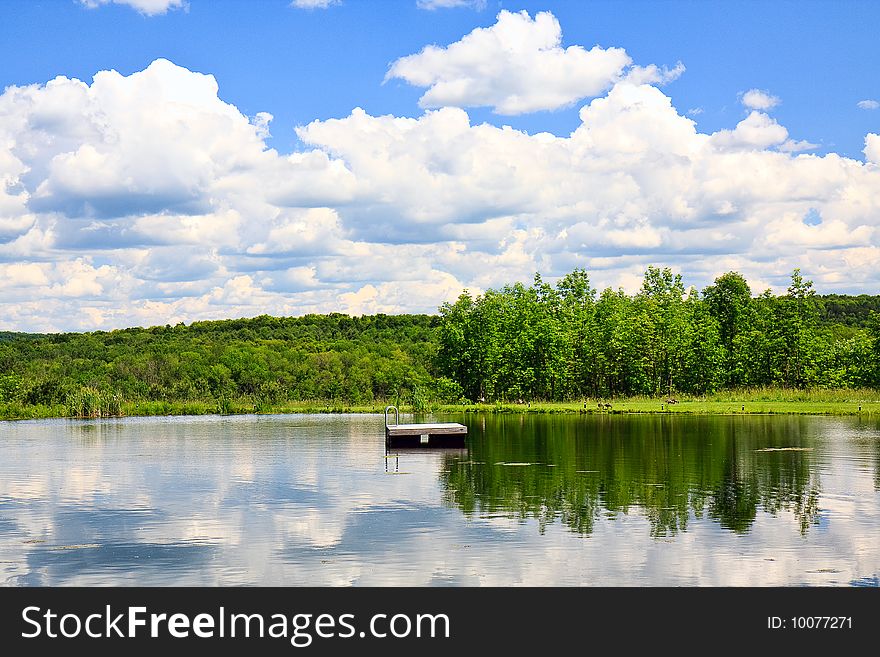 Pond And Clouds