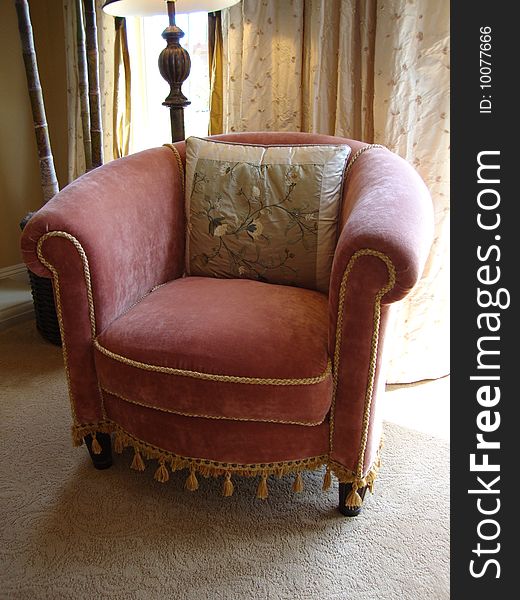 Beautiful rose colored bed room chair