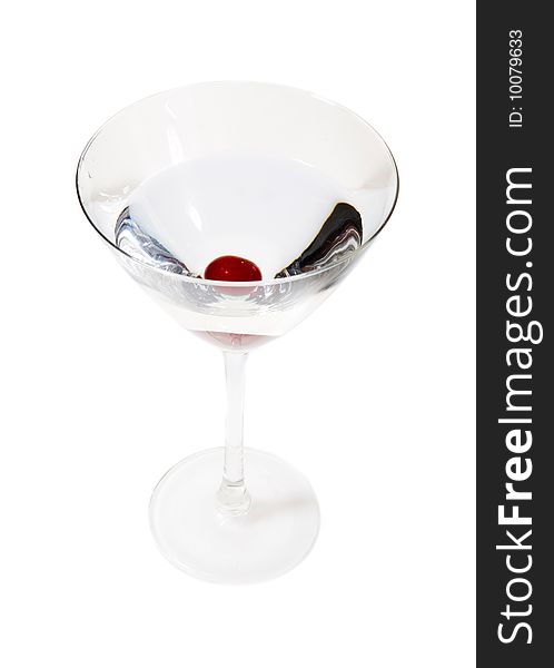 Cocktail with cherry on white ground