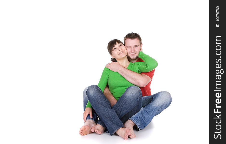 Young loving couple together on white background. Young loving couple together on white background