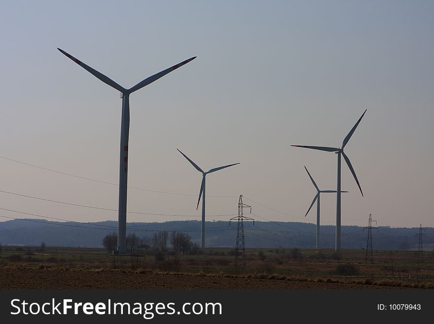 Wind turbines. Energy. Beautiful meadow