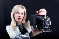 Blonde With Camera Stock Image