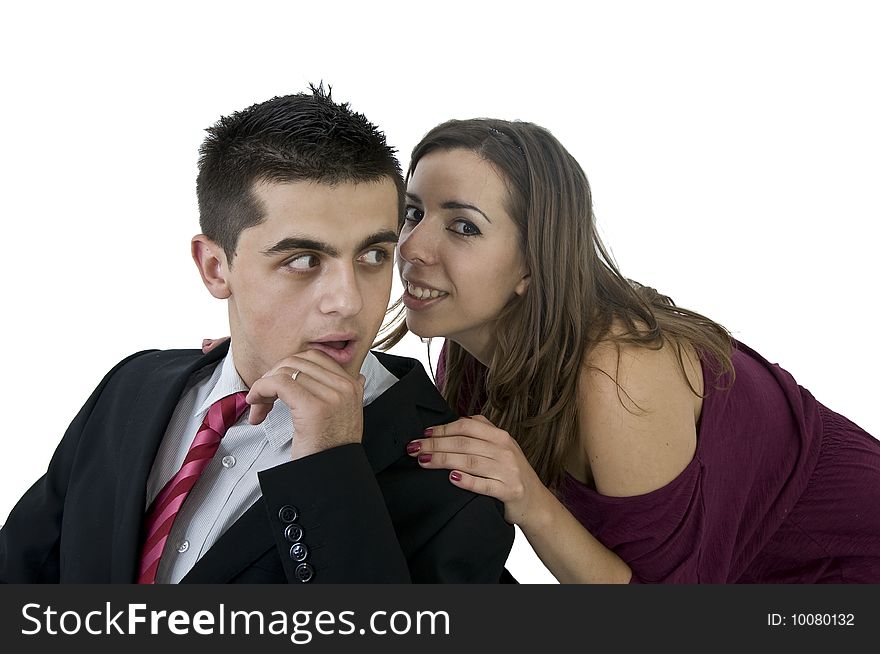 Young woman whispering in his ear
