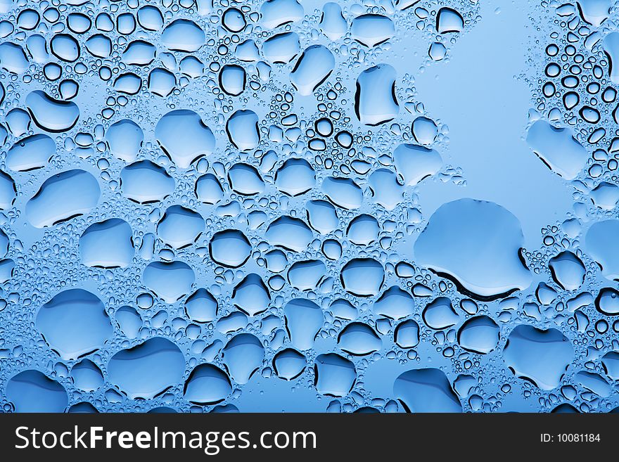 Abstract blue water drops background