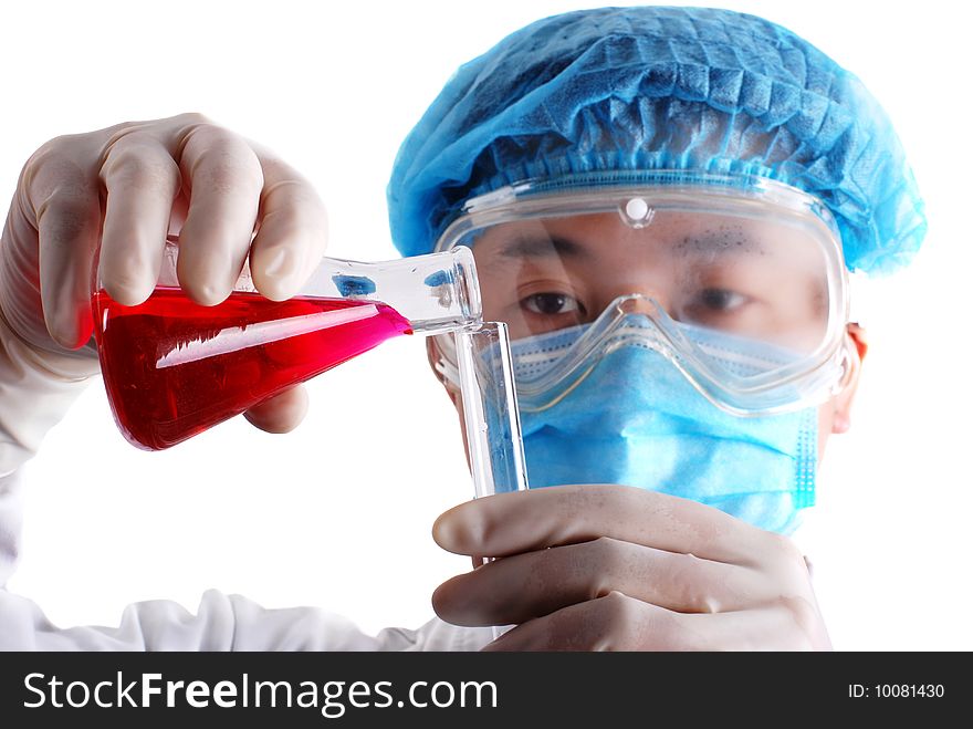 Chemist holding flask with red  liquid