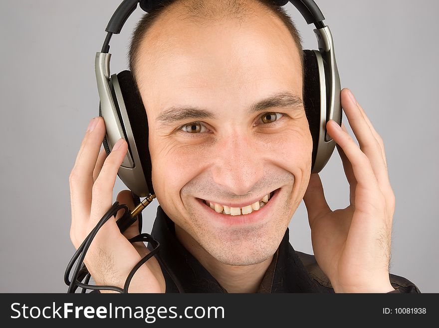 Man listening music in headphones