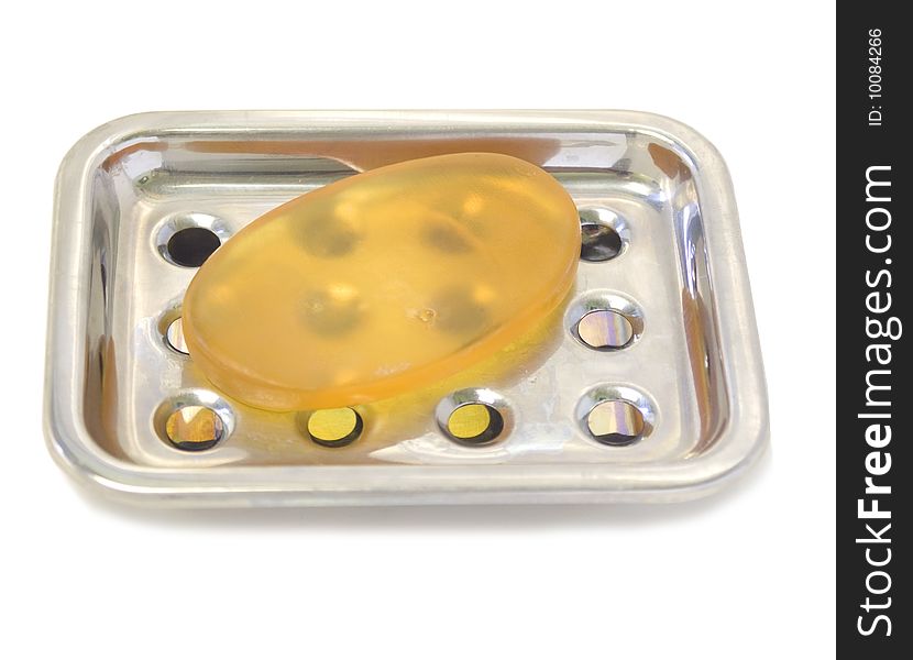 Clear soap in a stainless steel dish