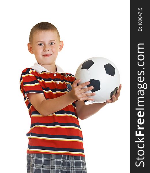 Young boy holding football in his hand. Young boy holding football in his hand