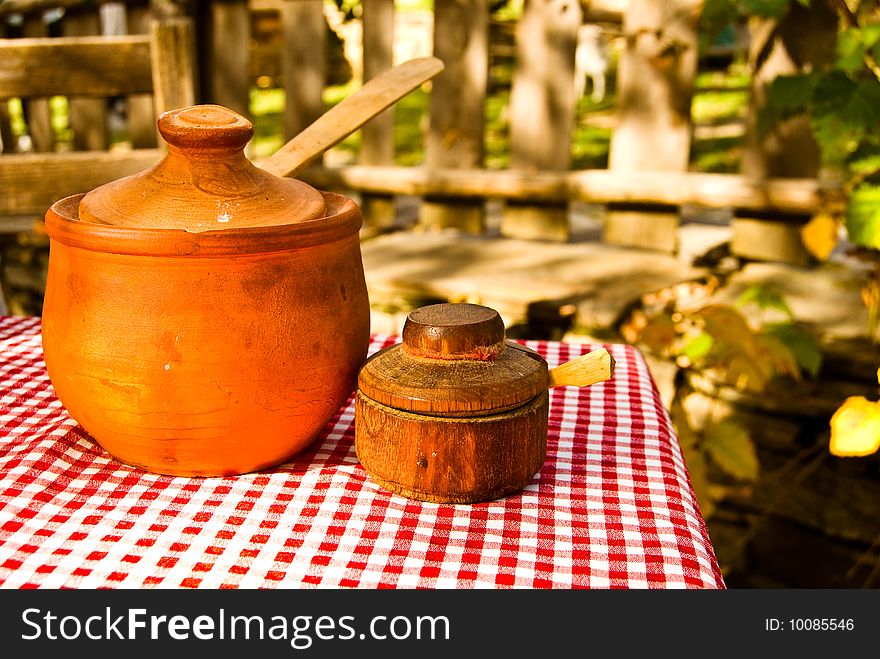 Some traditional bulgarian dishes over a table in a tavern. Some traditional bulgarian dishes over a table in a tavern