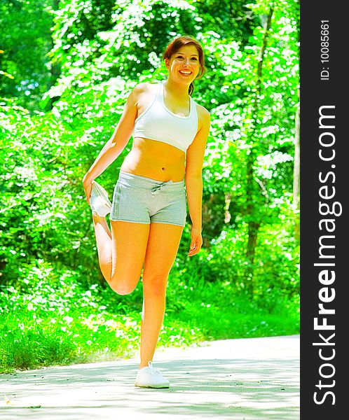 Woman runner exercising, from a complete series of photos. Woman runner exercising, from a complete series of photos.