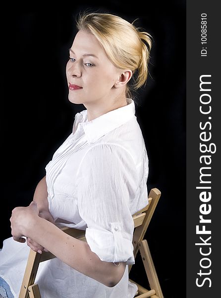 Studio portrait of a beautiful woman with blond hair