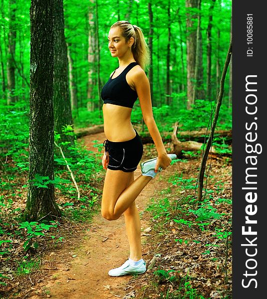 Blonde haired woman exercising, from a complete series of photos. Blonde haired woman exercising, from a complete series of photos.