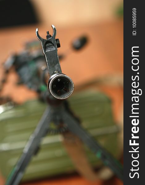 A machine gun Kalashnikov barrel. Close up