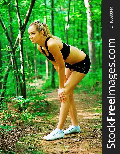 Blonde haired woman exercising, from a complete series of photos. Blonde haired woman exercising, from a complete series of photos.