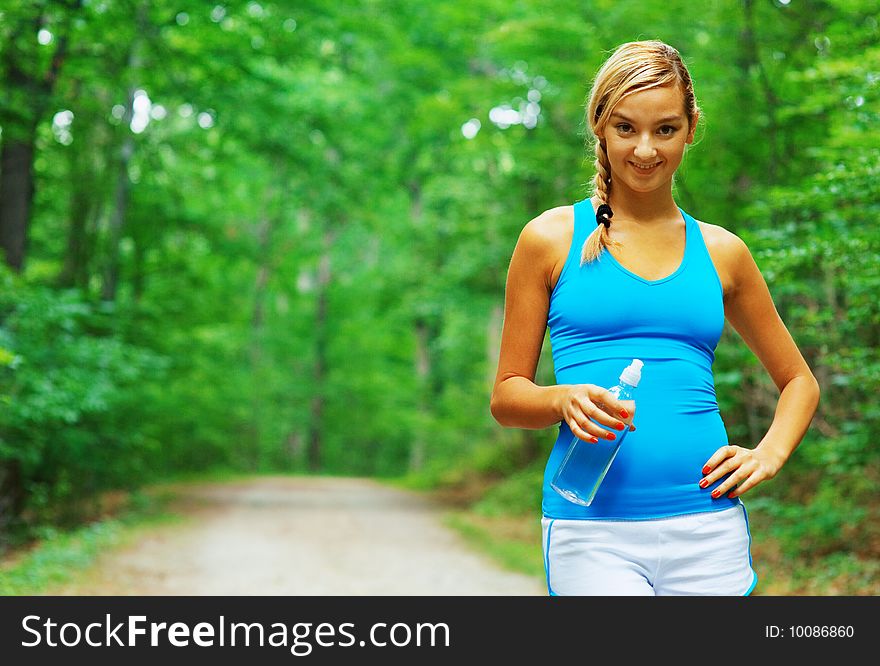 Woman runner exercising, from a complete series of photos. Woman runner exercising, from a complete series of photos.