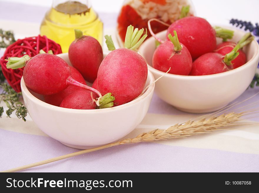 Some fresh red radish in two bowls