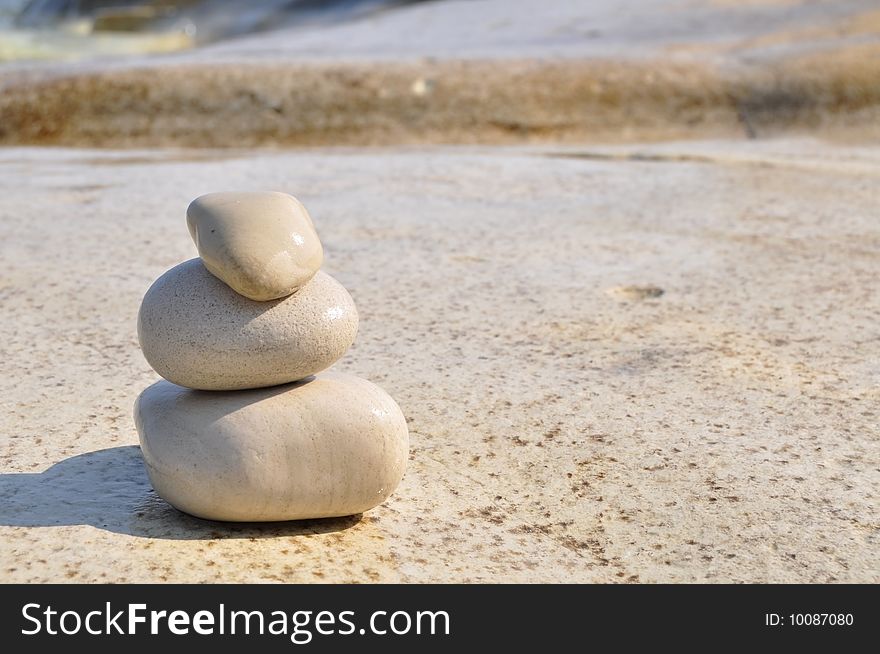 Three stones on the beach