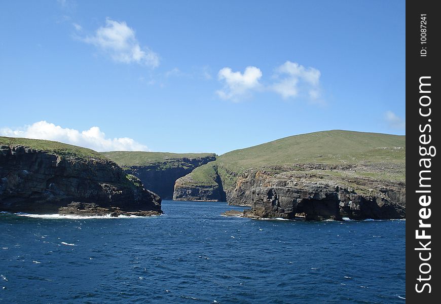 View of Hebridean island from the sea. View of Hebridean island from the sea