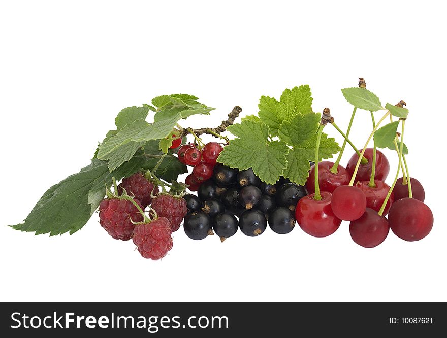Raspberries, cherries, currant isolated on white