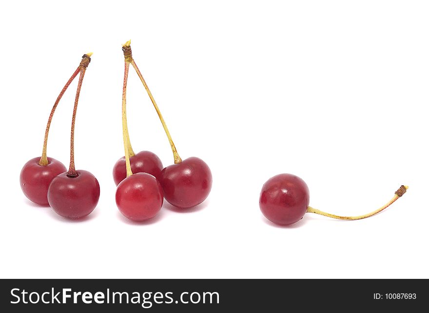 Ripe cherries isolated on white