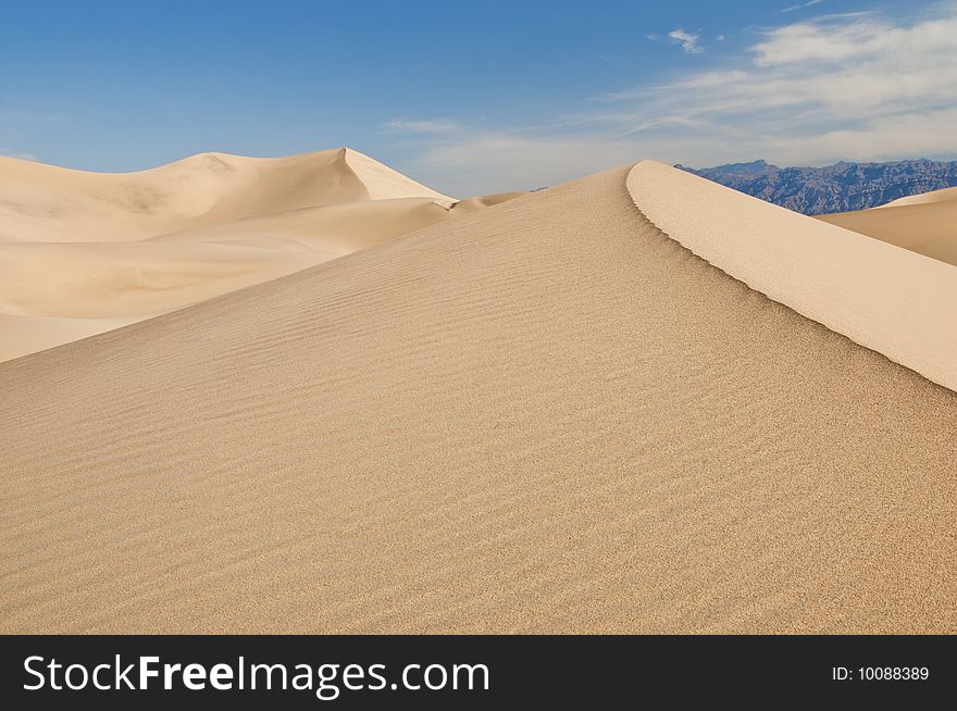 Smooth sand dunes in Death Valley National Park, CA