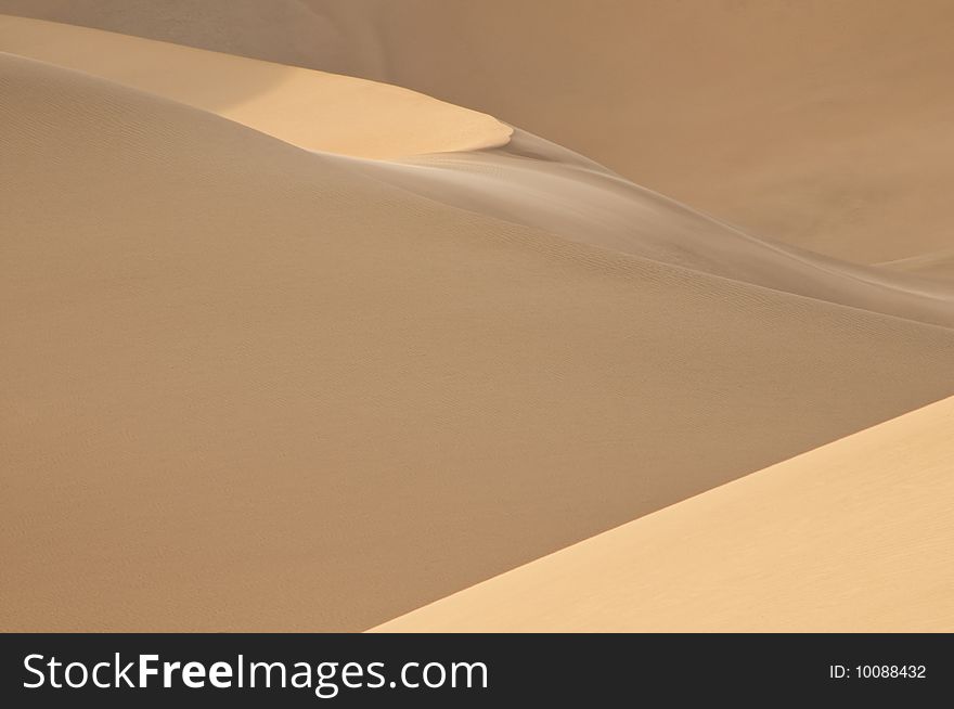 Smooth sand dunes in Death Valley National Park, CA