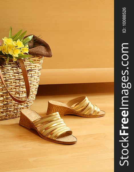 Female summer footwear, bag and flowers