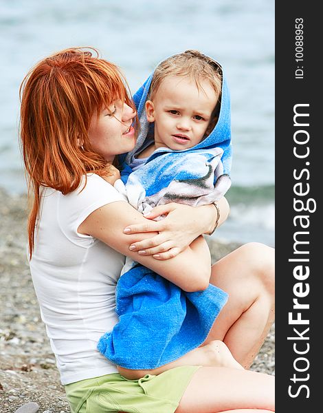 Mother And Son On Beach