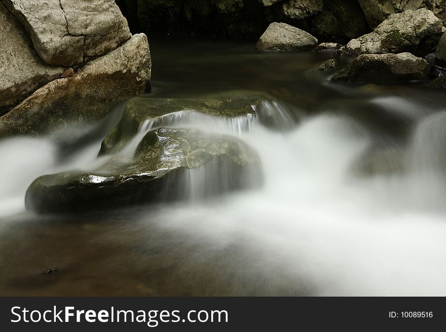 River in the forest, slow shutter photo