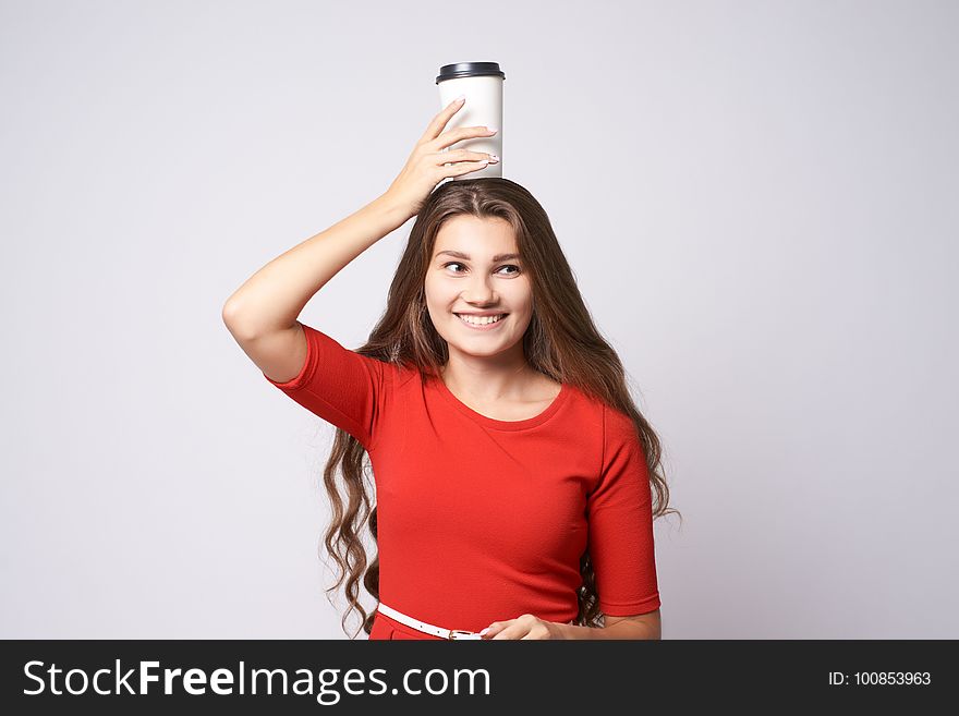 Portrait girl. Glass coffee. Happy smile. Red dress